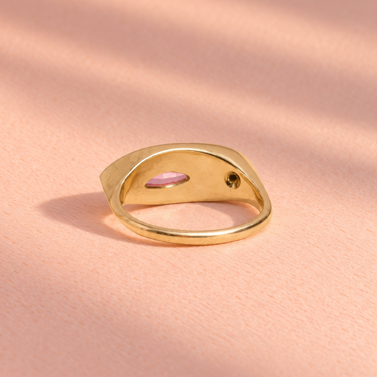 Fancy pink marquise sapphire with bezel setting creates an elegant touch in this Ruinette Bijoux handcrafted Kitty Cat ring.