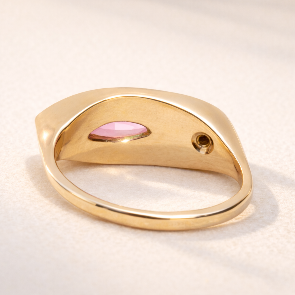 Kitty Cat Ring no. 02 back view in 18k yellow gold with pink sapphire and peridot. A luxury ring from the Kitty Cat Collection by Ruinette, perfect for a handcrafted gift.